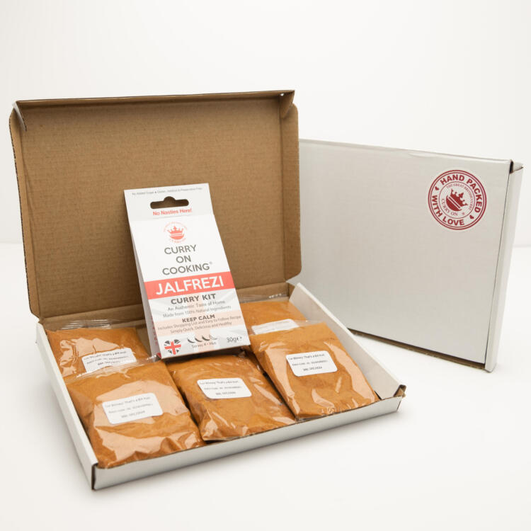 5 sachets 1 Jalfrezin Curry Kit displayed in a letter postal box open with a closed box with a handpacked with love sticker